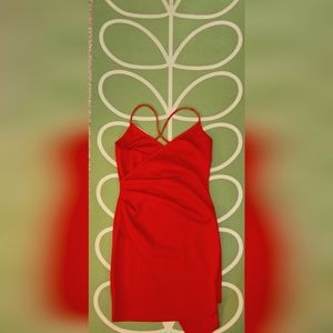 Red form fitting dress by Charlotte Russe